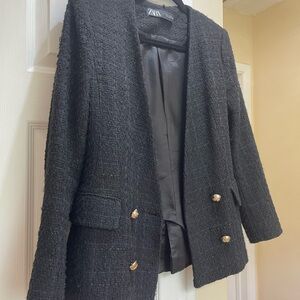 Very nice and different jacket with decorative buttons.